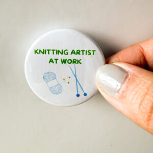 Knitting artist at work - knitting pin badge
